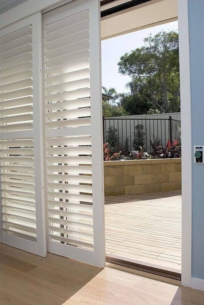 plantation shutters on sliding glass doors
