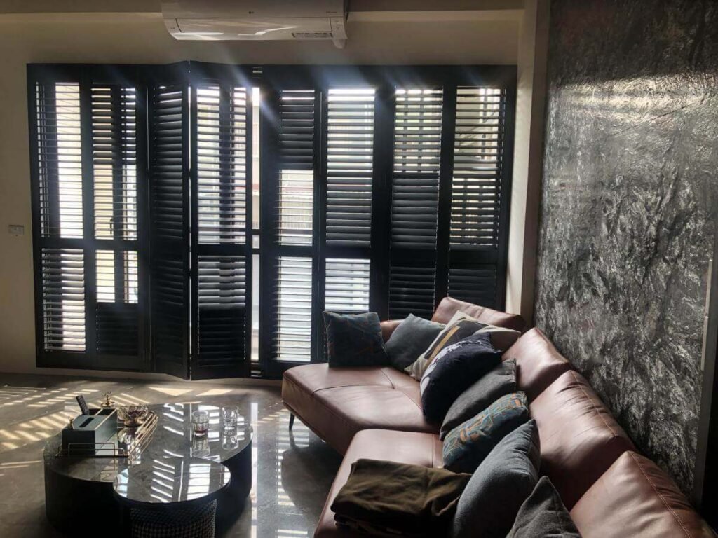 Black shutters on sliding glass doors