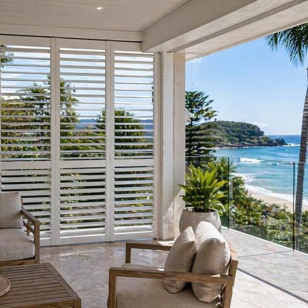 Aluminium shutters in coastal Australian home with ocean views
