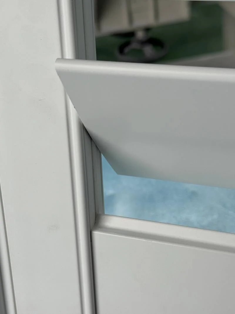 Close-up of aluminium shutter gear tilt rod mechanism