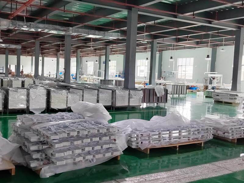 Automated assembly stations stringing ladder cords and fitting headrails for faux wood venetian blinds