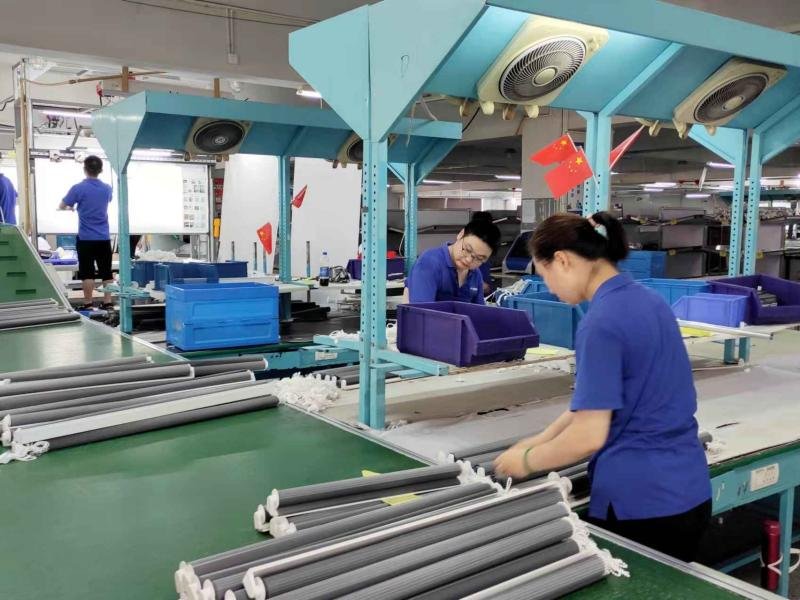 Assembly line workstation - roller shade tube and bracket installation