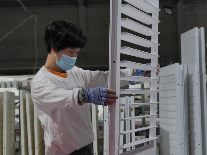 FQC quality inspection verifying dimensions, tilt function and coating quality