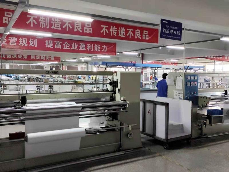 Fabric cutting station - automated cutting for roller and zebra shades