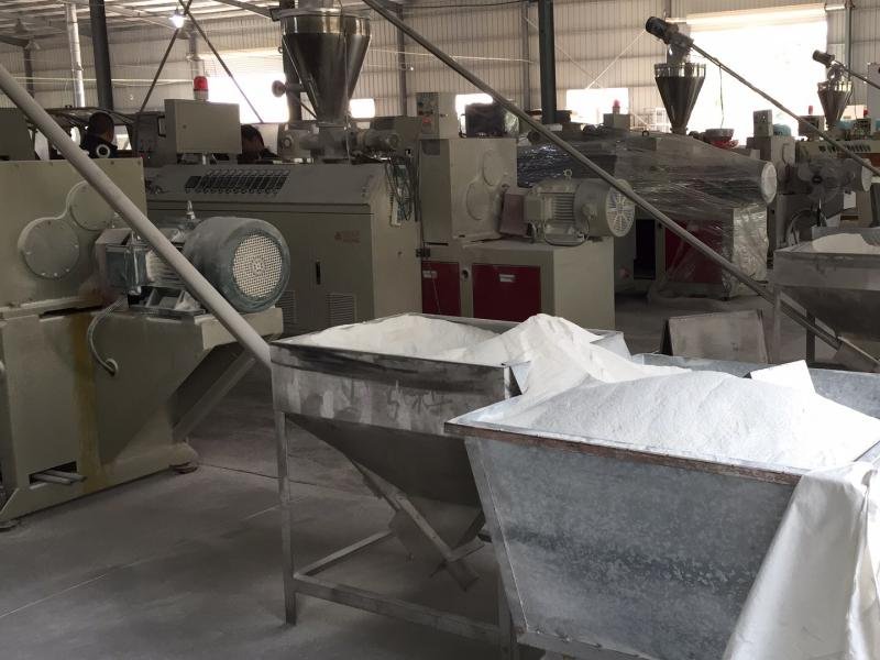PVC resin mixing and compounding equipment with high-speed blenders and storage silos