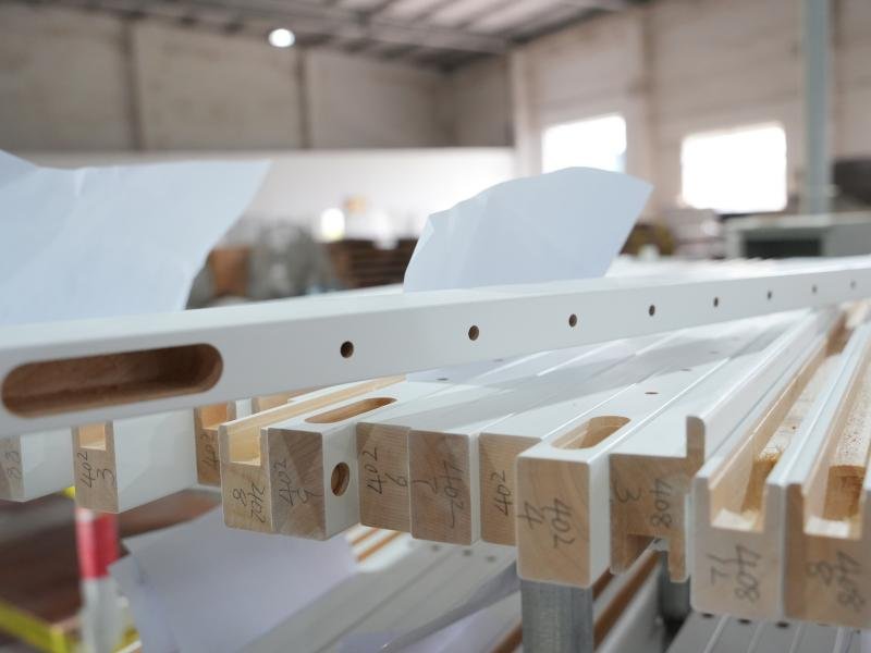 CNC machining center processing wood plantation shutter components